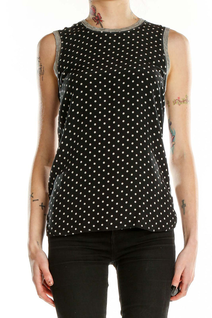 Front view of J.Crew black polka dot sleeveless blouse with gray trim