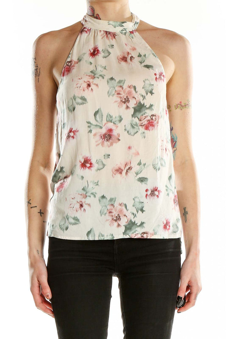 Front view of white floral halter neck top by Zara Trafaluc