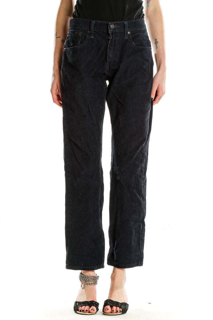 Front view of Levi's black corduroy straight leg pants on model