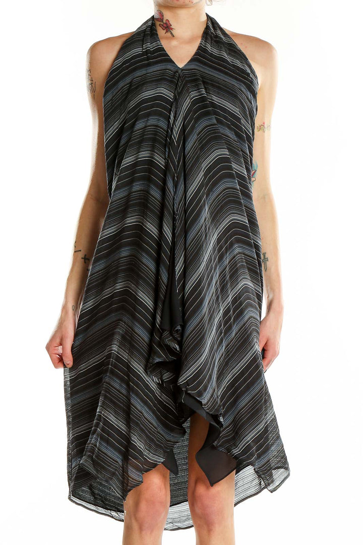 Front view of Lauren Ralph Lauren black striped halter neck cocktail dress with asymmetrical hem