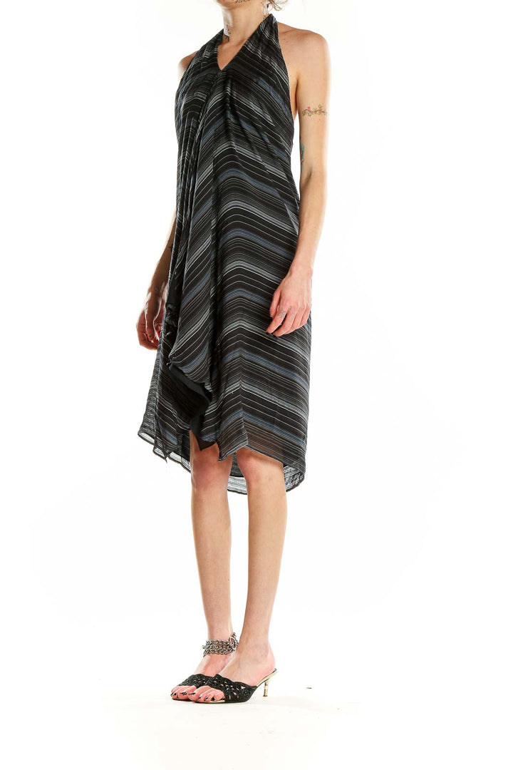 Front view of Lauren Ralph Lauren black striped halter neck cocktail dress with asymmetrical hem