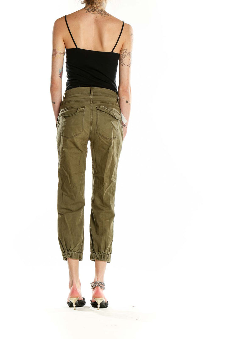 Back view of olive green cropped utility pants from Express