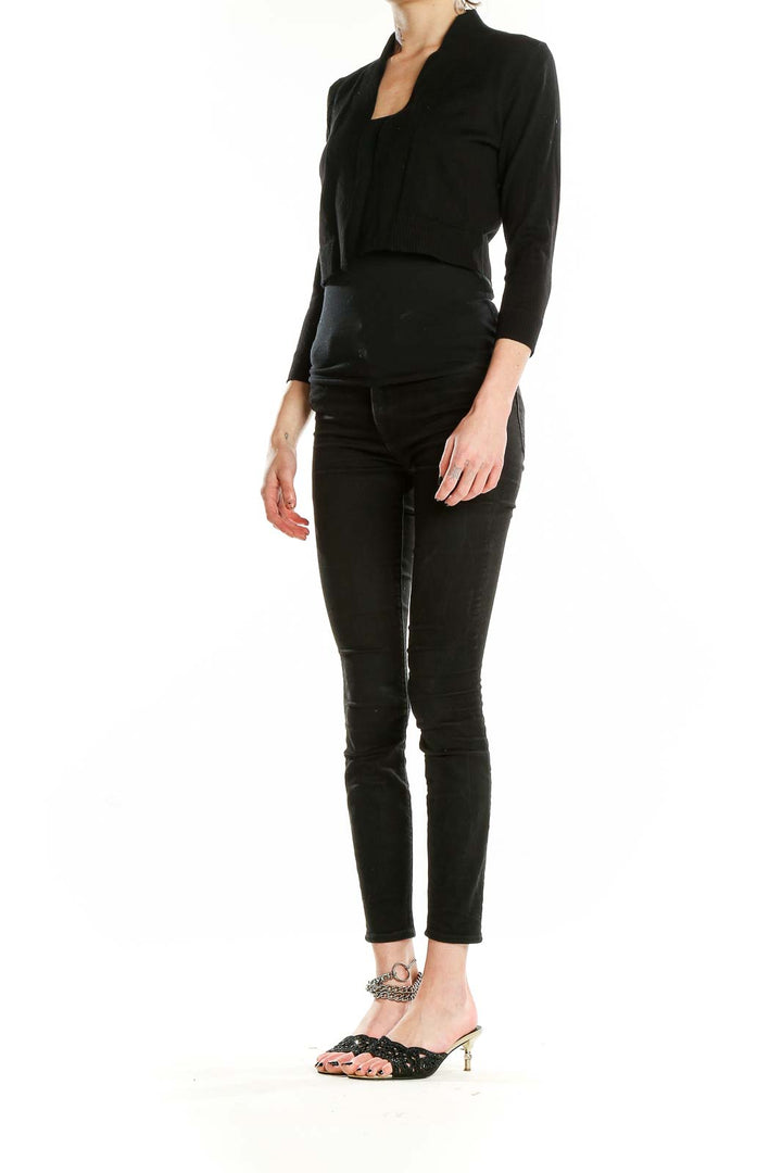 Front view of Calvin Klein black cropped jacket with stand-up collar