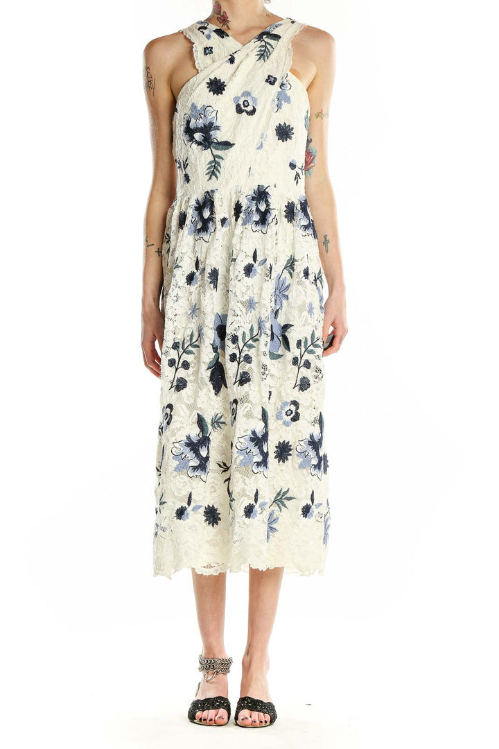 Front view of Tahari Arthur S. Levine ivory lace midi dress with blue floral pattern