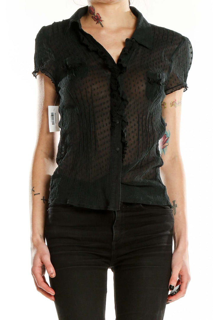 Front view of Bebe black sheer silk button-up blouse