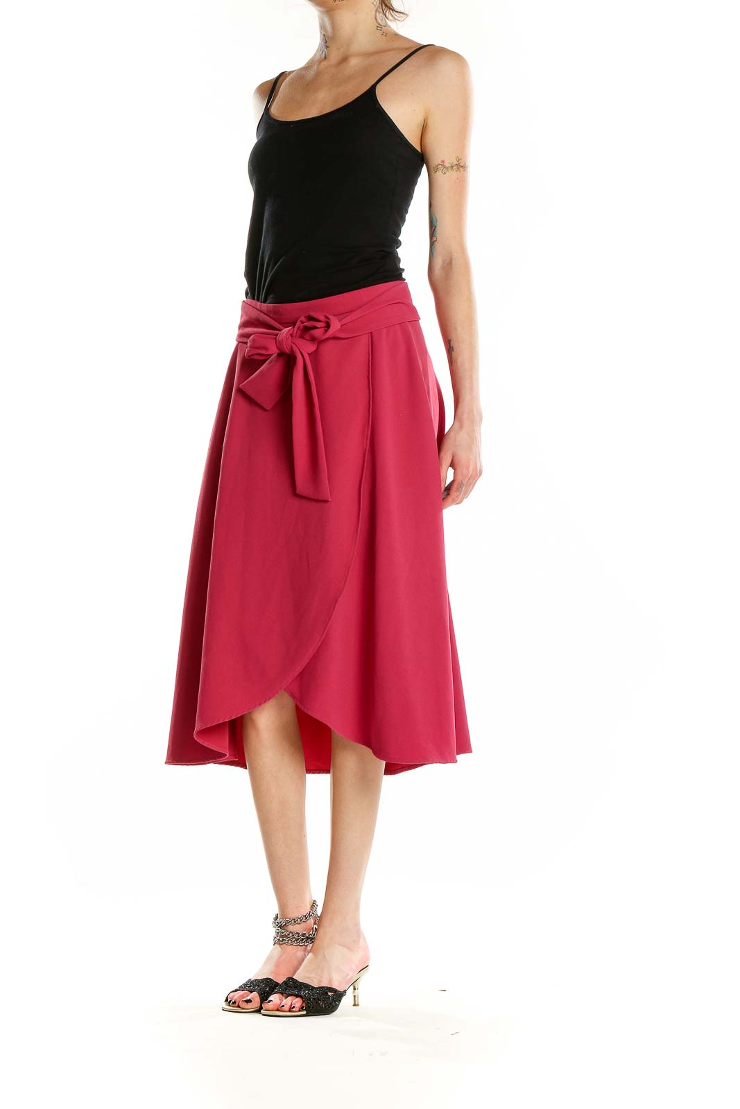 Front view of Ann Taylor pink wrap-style midi skirt with tie waist