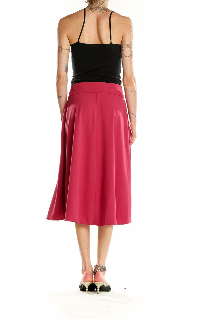 Back view of Ann Taylor pink midi skirt showing flowy A-line silhouette