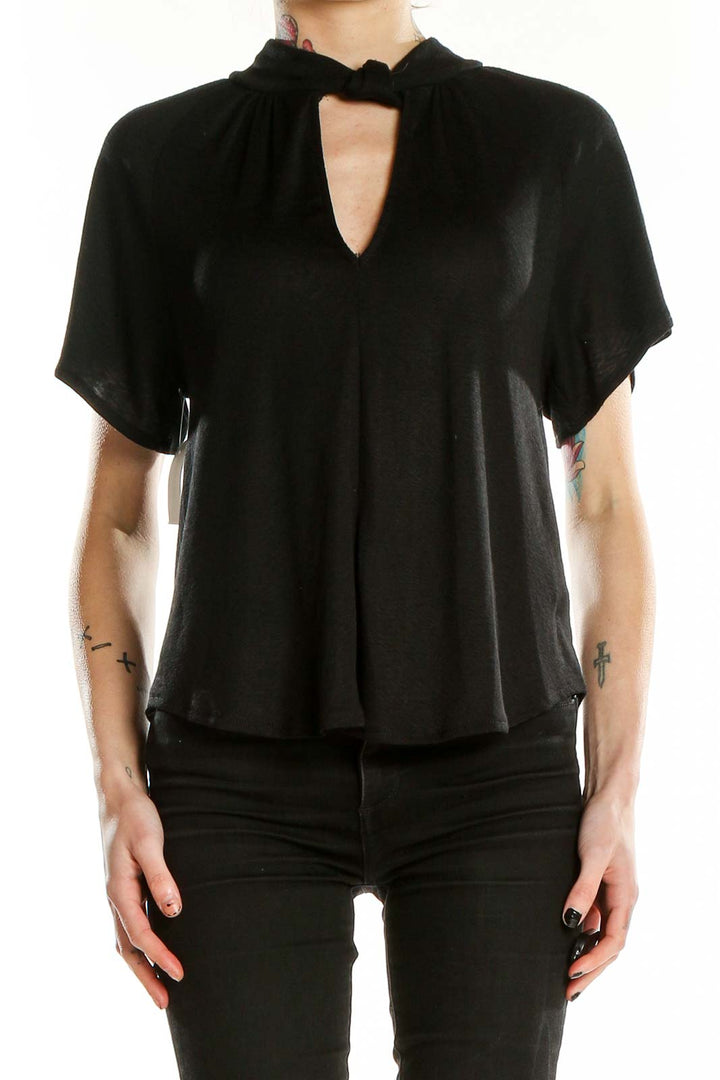 Front view of RACHEL Rachel Roy black blouse with keyhole neckline