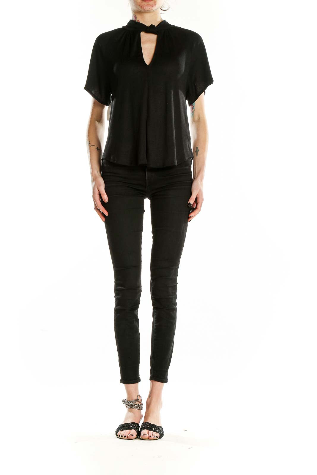 Front view of RACHEL Rachel Roy black blouse with keyhole neckline