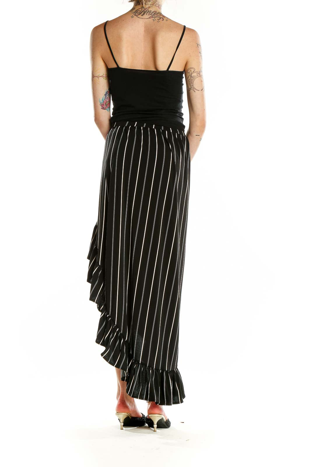 Back view of Express black and white striped high-low skirt showing asymmetrical ruffle hem