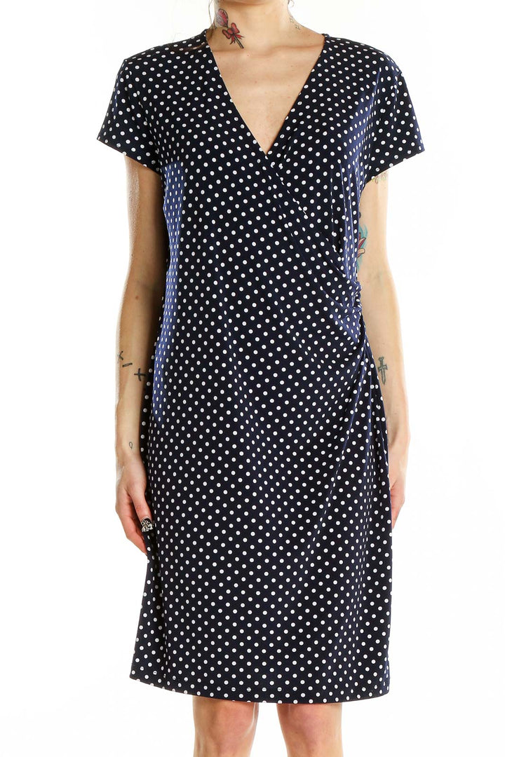 Front view of Jones New York black polka dot wrap dress with V-neck and short sleeves