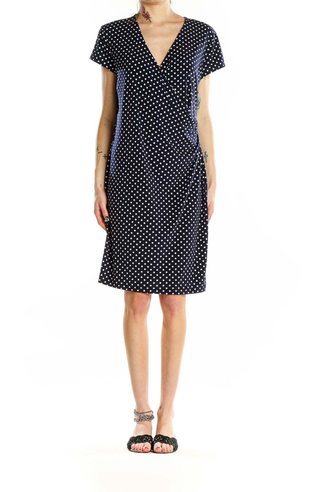 Front view of Jones New York black polka dot wrap dress with V-neck and short sleeves