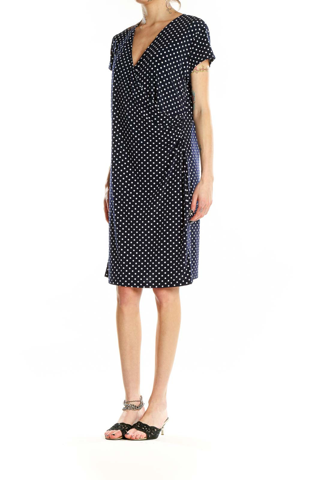 Front view of Jones New York black polka dot wrap dress with V-neck and short sleeves