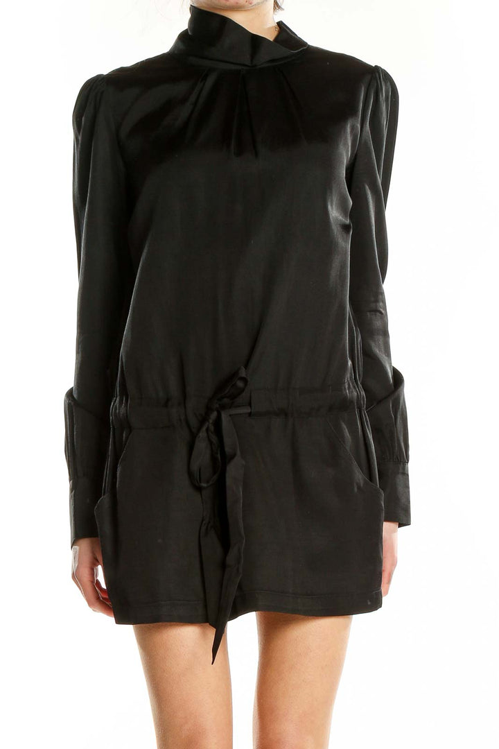 Front view of black Roni mini dress with turtleneck and puff sleeves