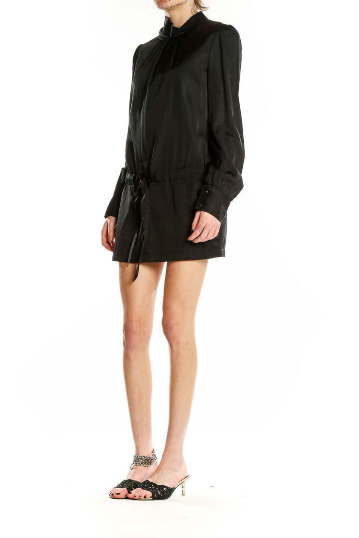 Front view of black Roni mini dress with turtleneck and puff sleeves