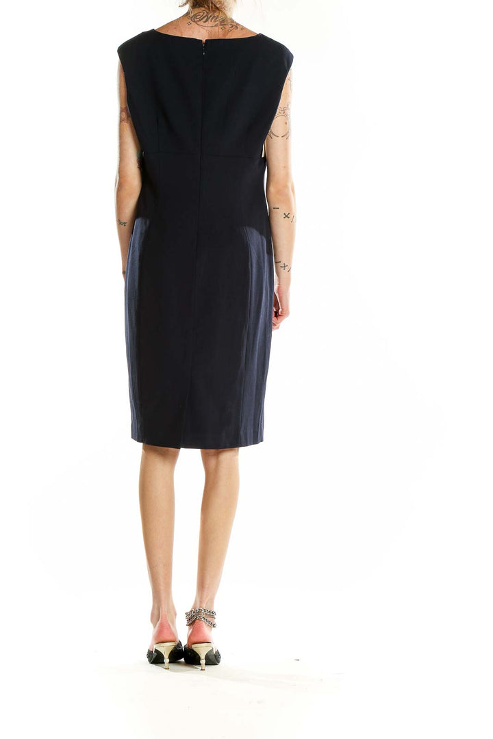 Back view of Calvin Klein black sheath dress showing sleek silhouette