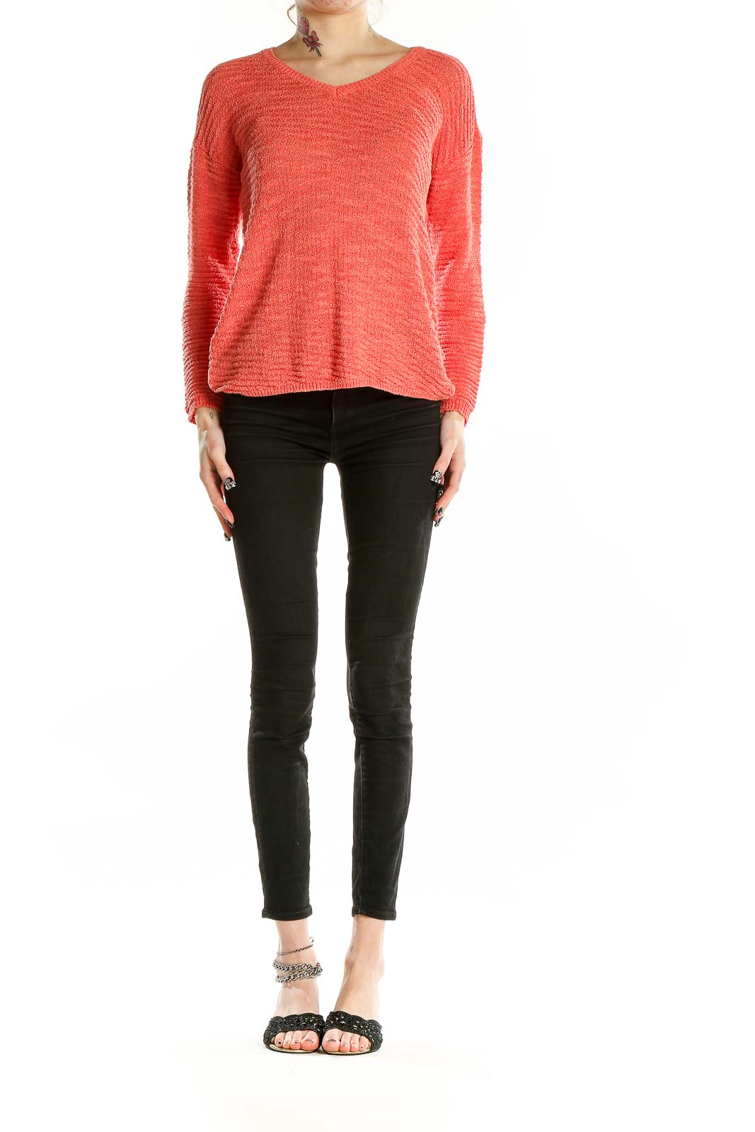 Front view of coral textured V-neck sweater by Calvin Klein Jeans