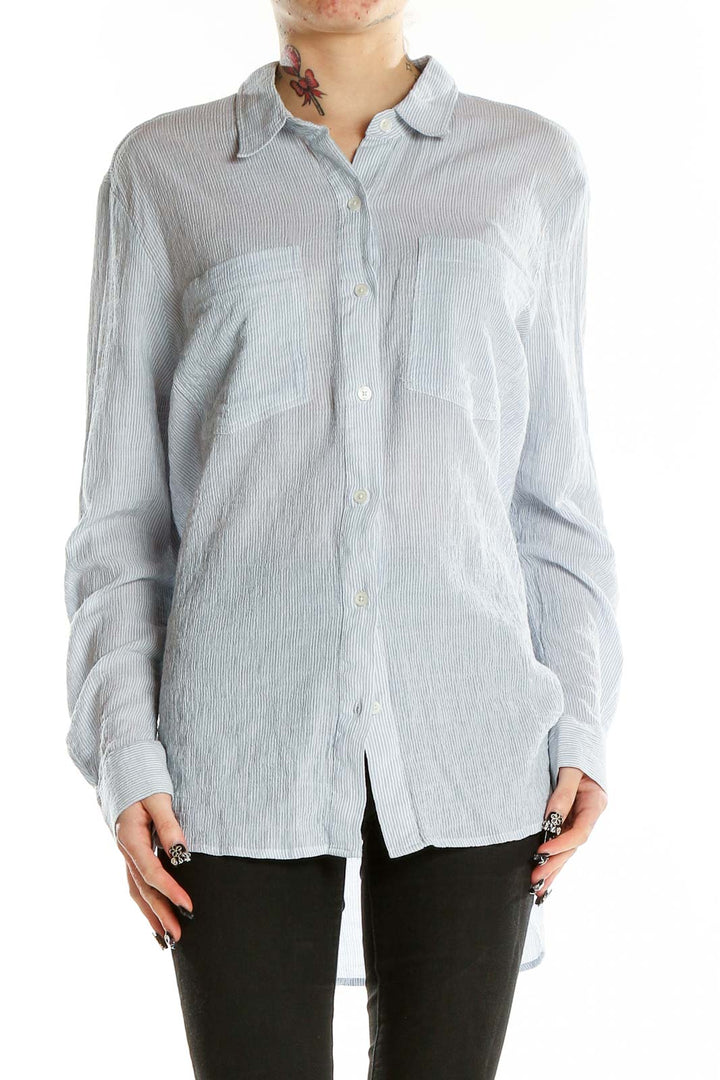 Front view of light blue MICHAEL Michael Kors button-down shirt