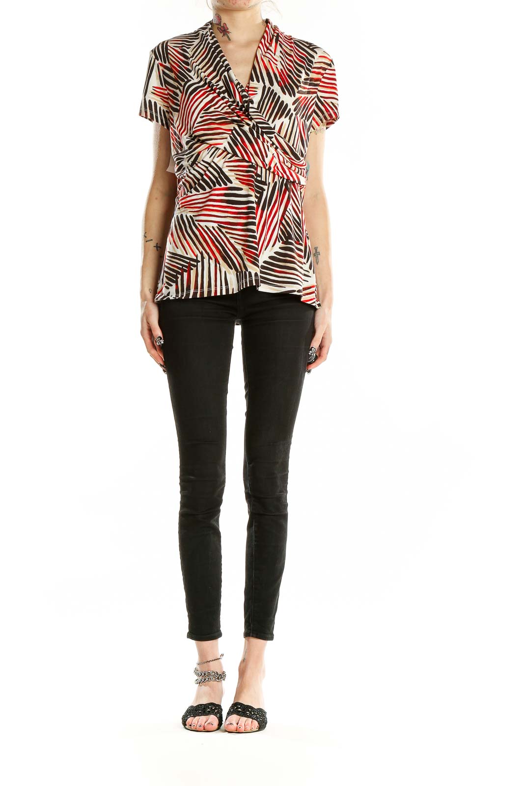 Front view of DKNY red and brown geometric print blouse with v-neck