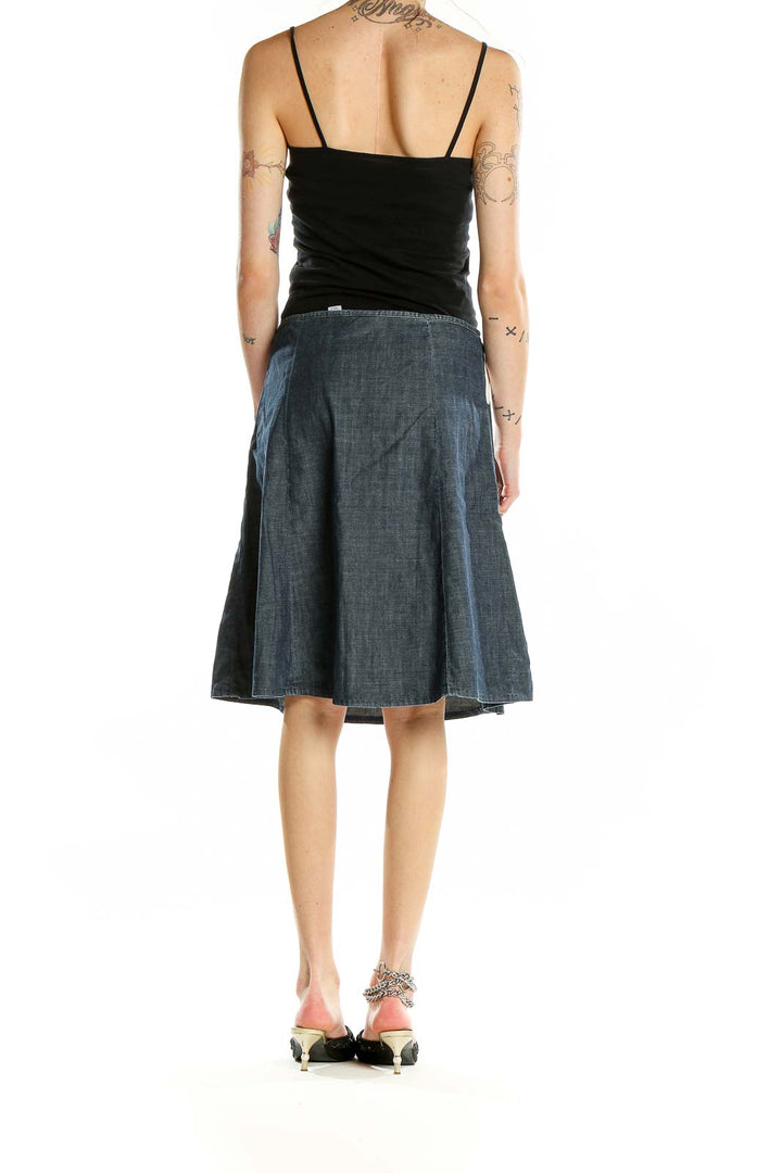 Back view of Halogen blue denim A-line skirt on model