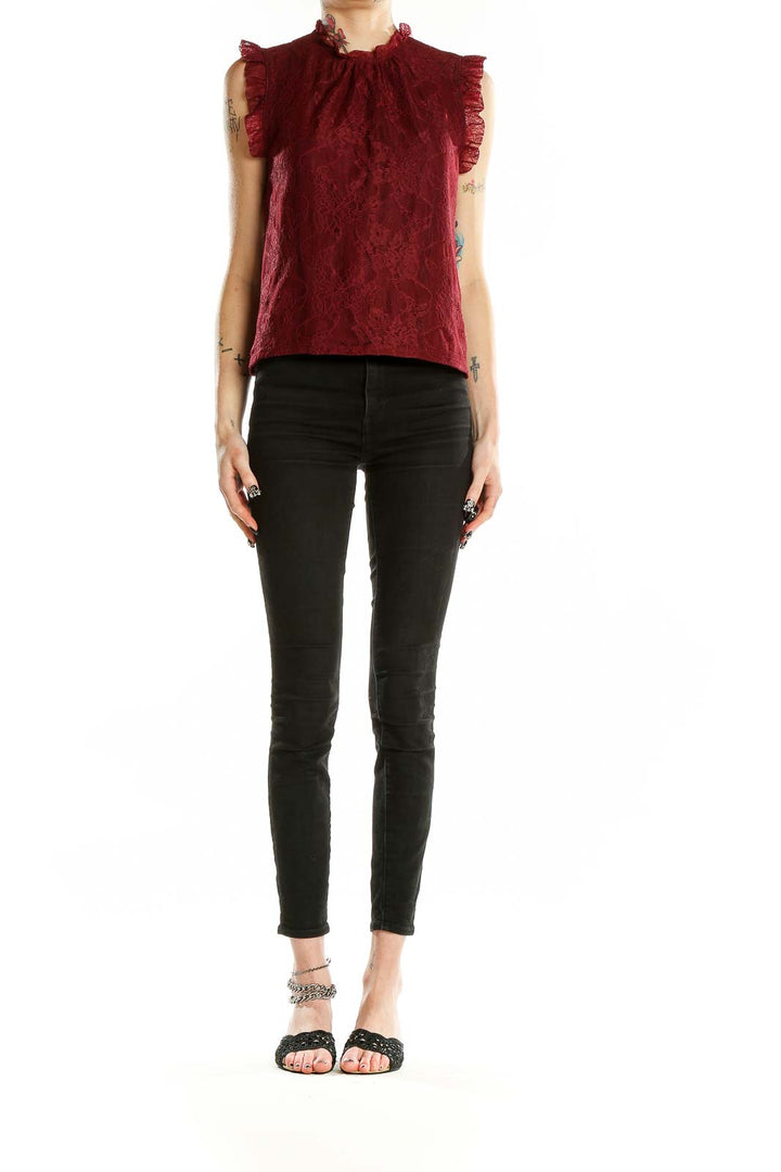 Front view of burgundy lace sleeveless blouse with high ruffled neckline