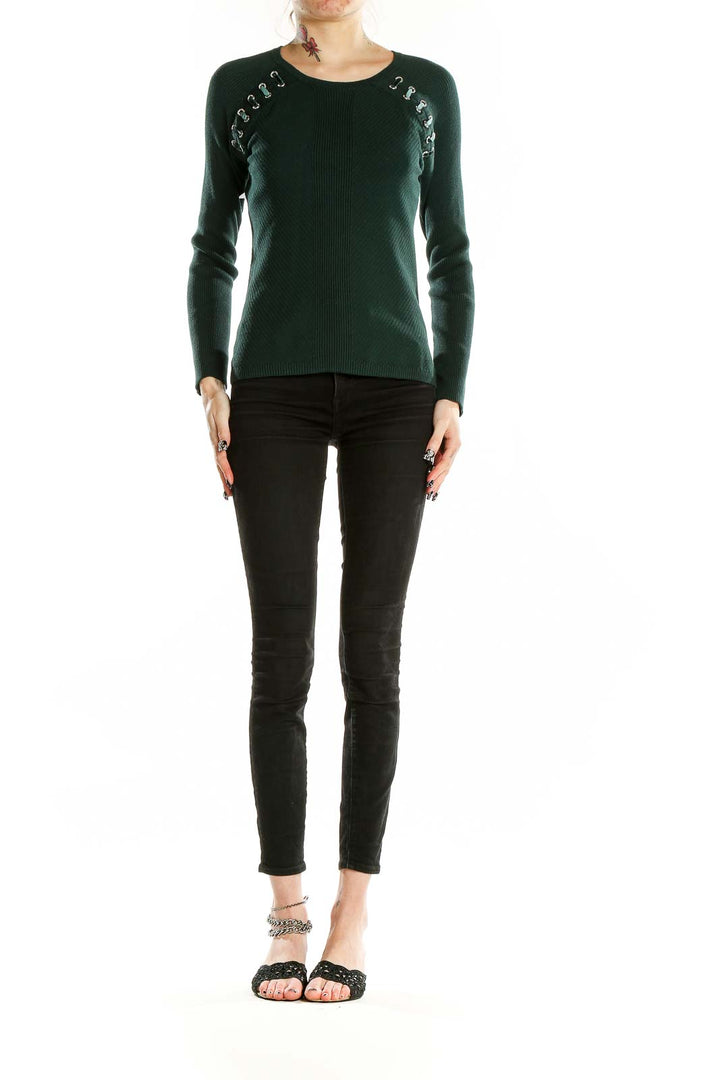 Front view of INC forest green ribbed sweater with lace-up shoulder details