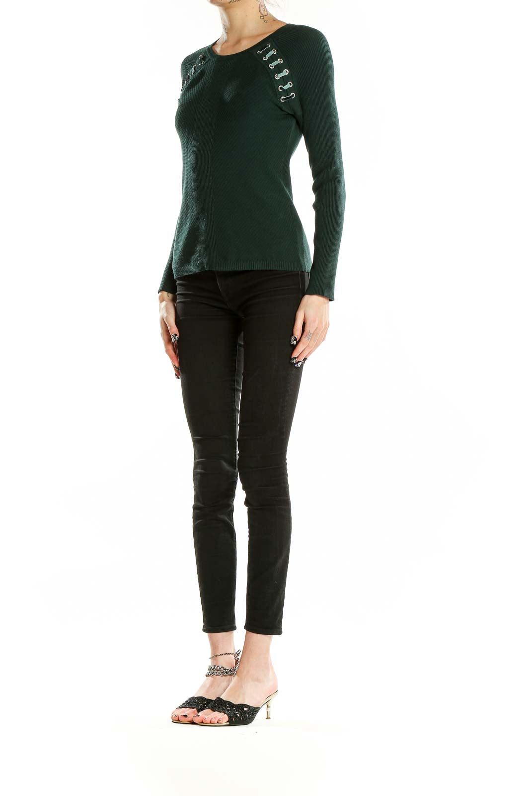 Front view of INC forest green ribbed sweater with lace-up shoulder details