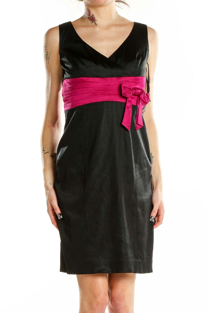 Front view of Jones New York black cocktail dress with pink sash