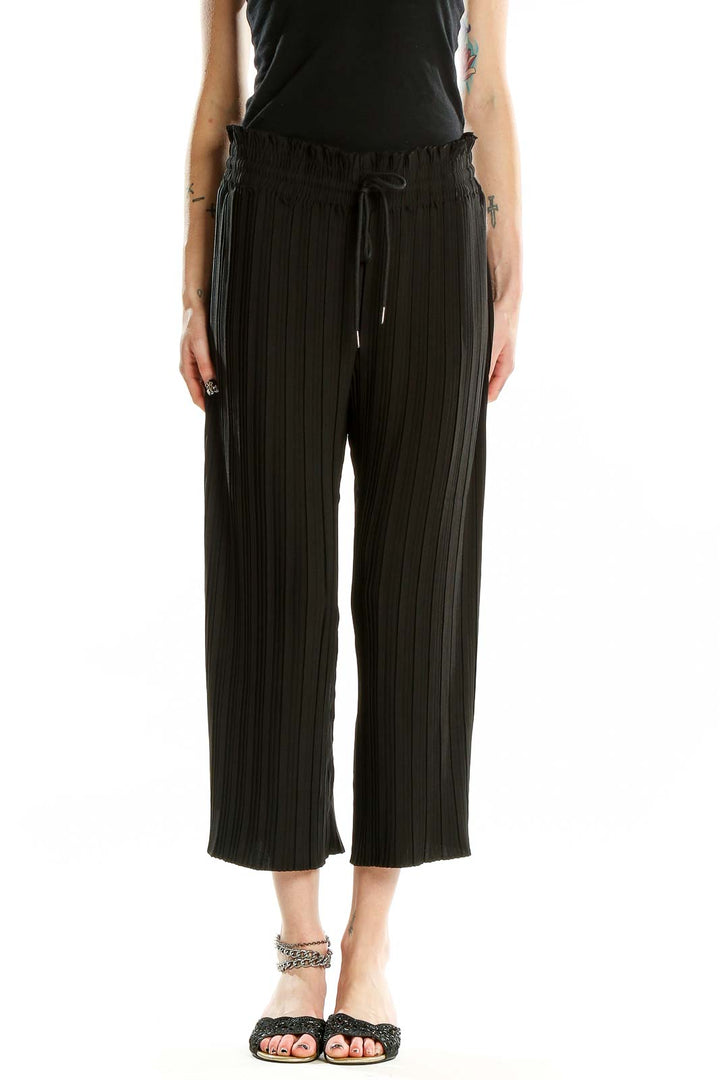 Front view of Rachel Zoe black pleated wide-leg cropped pants