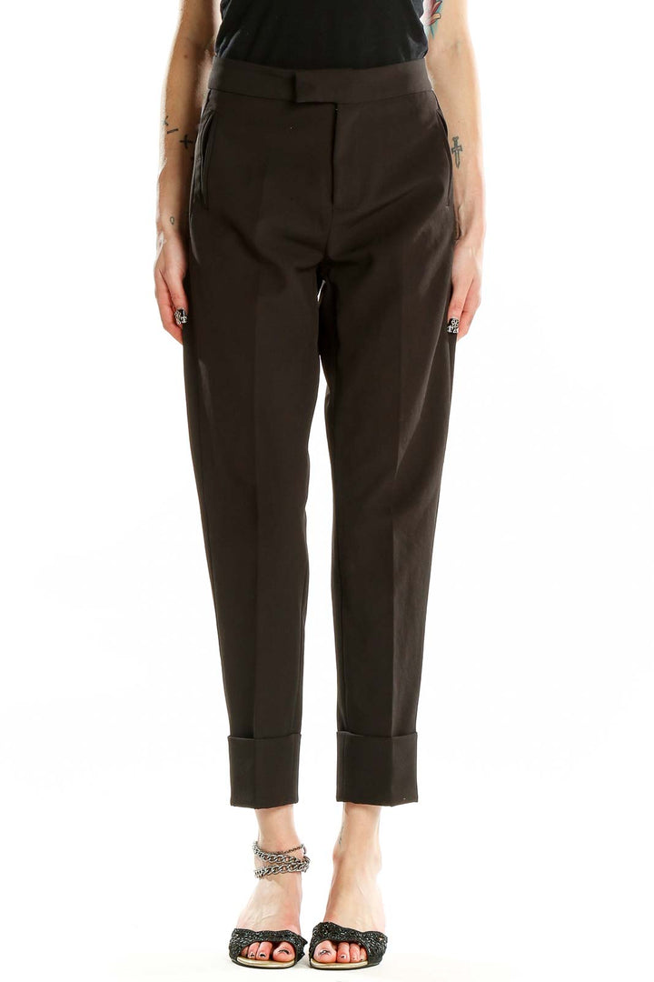 Front view of Akiabara brown tailored trousers with high waist and cuffed hems