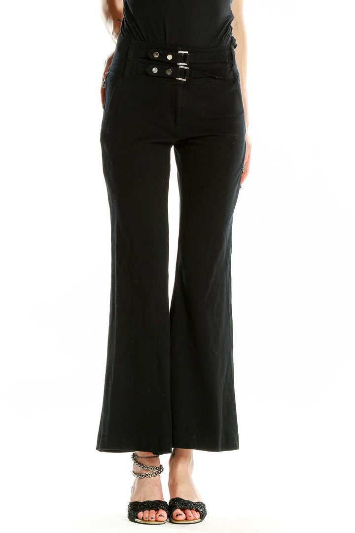 Front view of black high-waisted wide-leg pants with triple-buckle waist detail