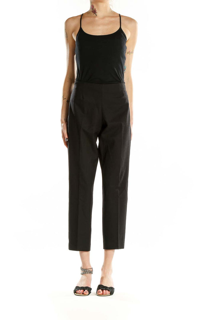 Front view of Theory black wool blend cropped trousers on model