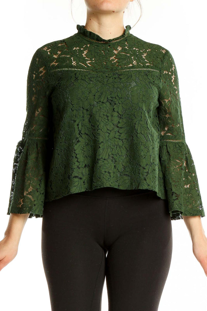 Front view of green lace crop top with bell sleeves by JACK by BB Dakota