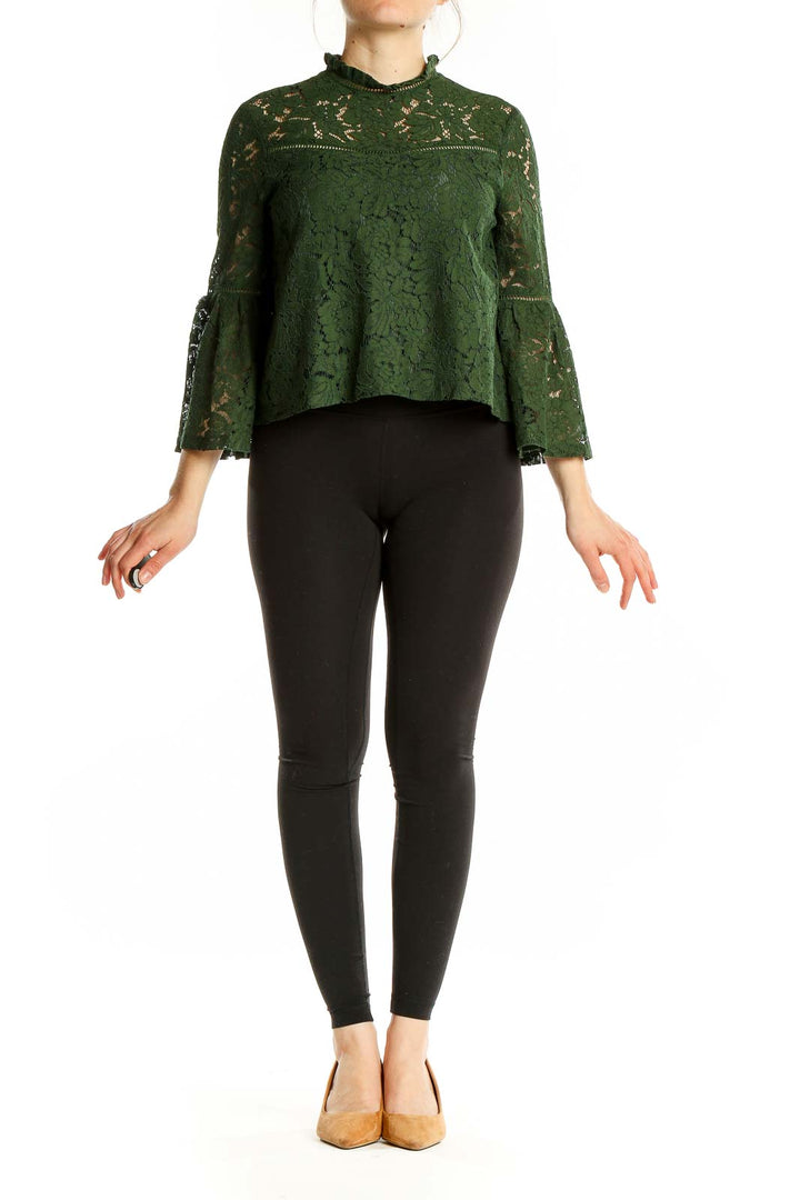 Front view of green lace crop top with bell sleeves by JACK by BB Dakota