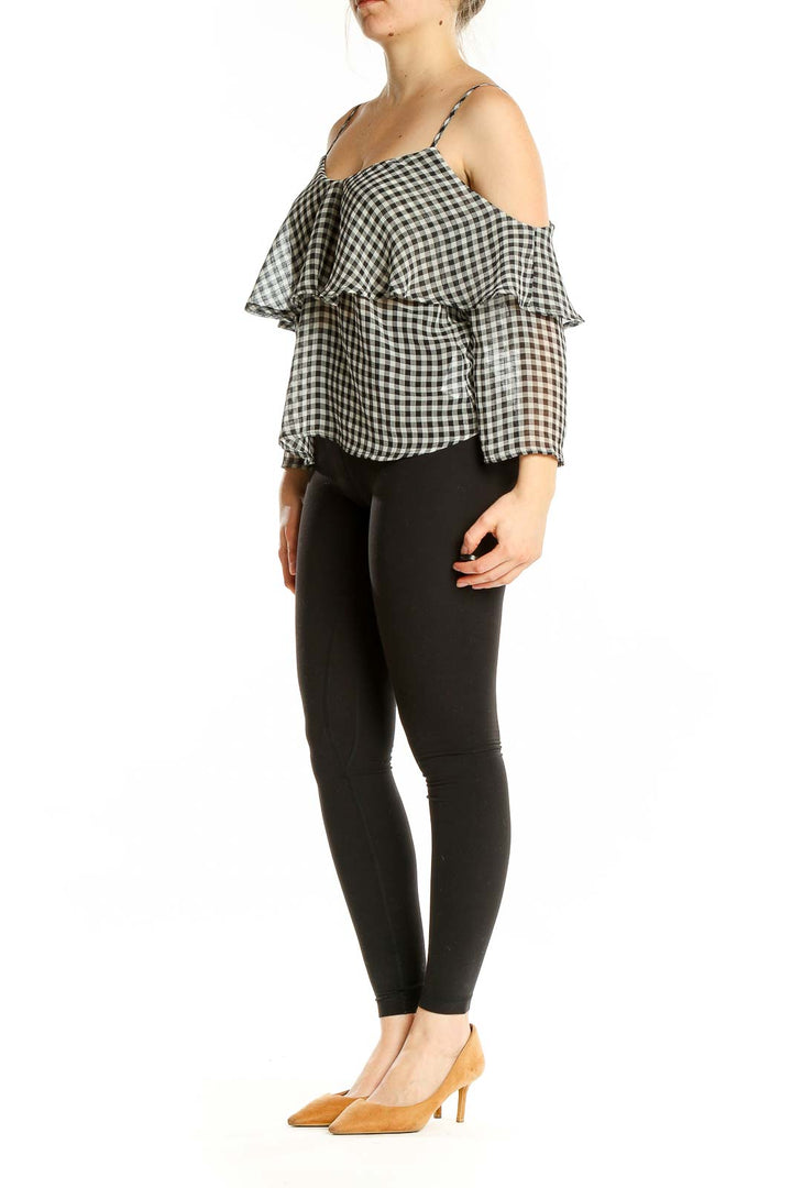 Front view of Ten Sixty Sherman Black and White Gingham Cold Shoulder Top