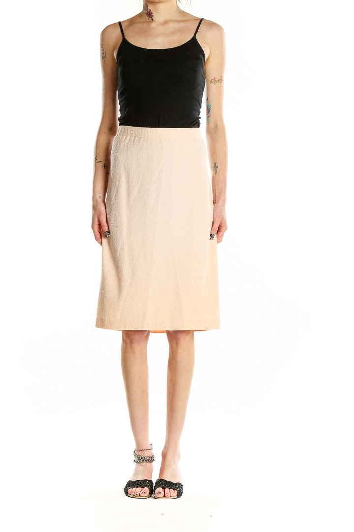 Front view of St. John Evening beige pencil skirt on model