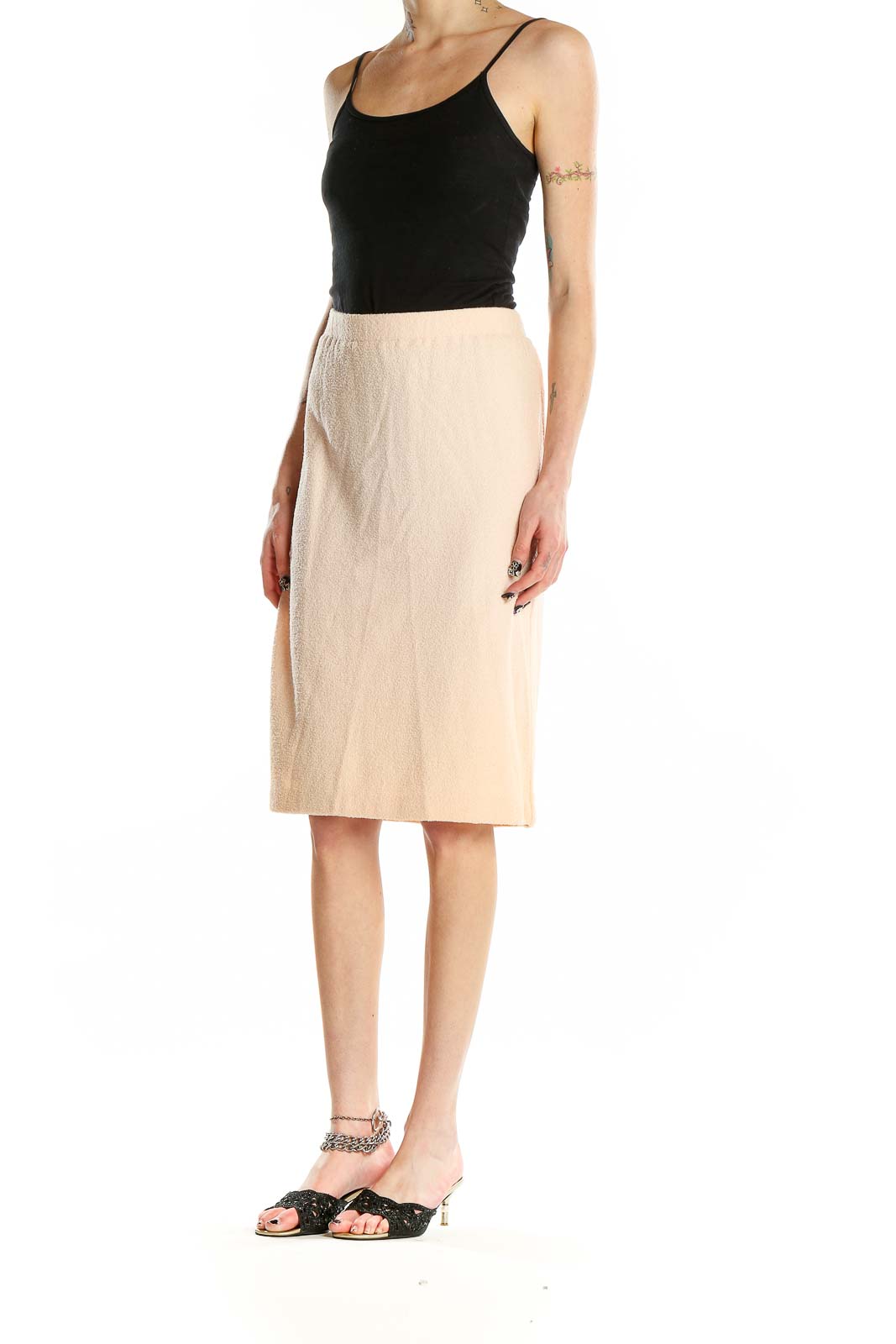 Front view of St. John Evening beige pencil skirt on model