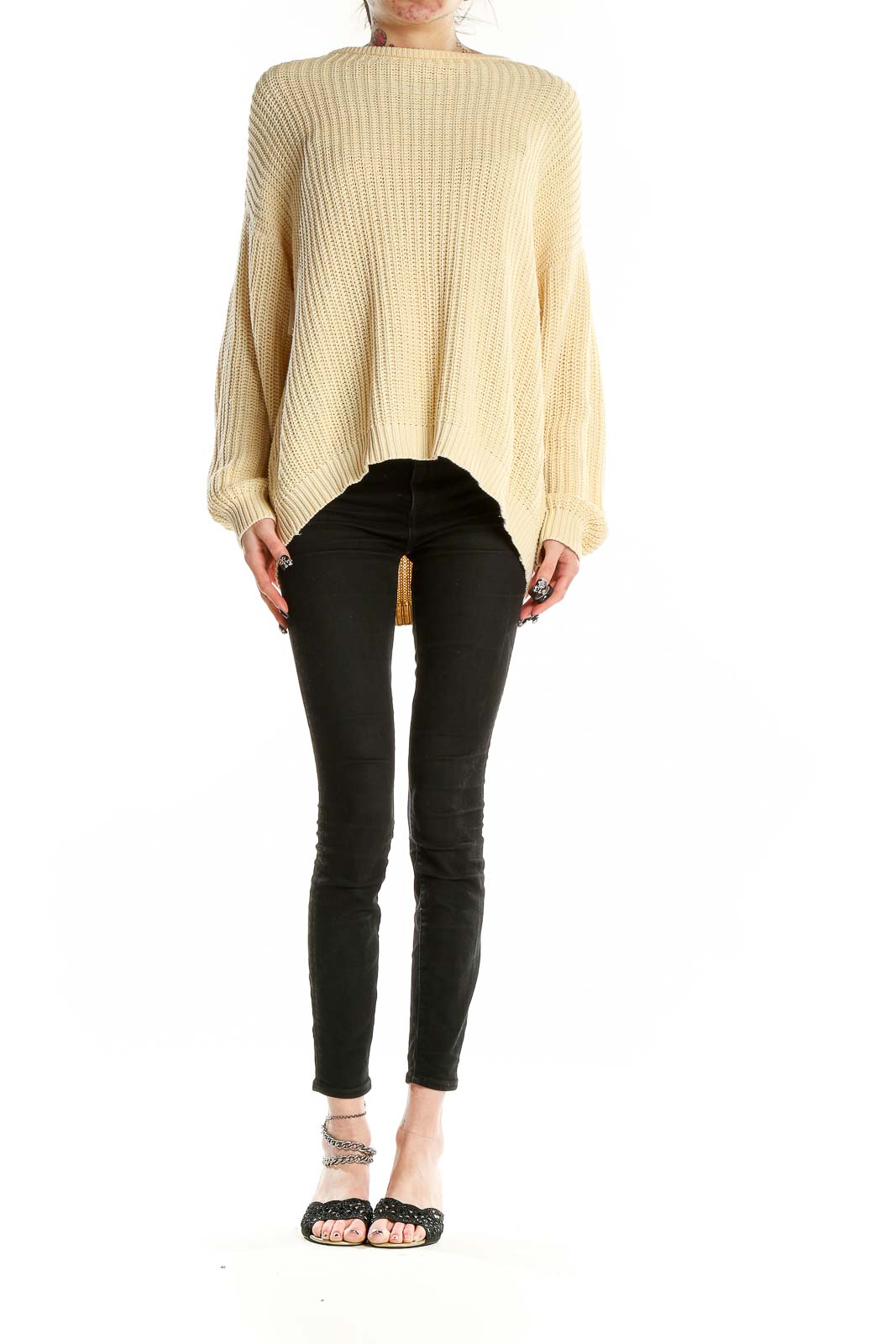 Front view of Margaux Lonnberg cream oversized ribbed cotton sweater