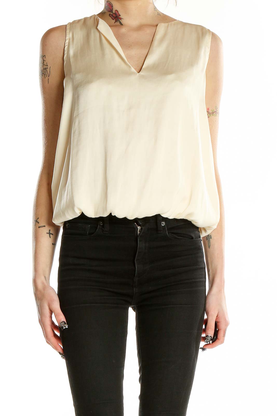 Front view of Sincerely Jules cream sleeveless V-neck blouse