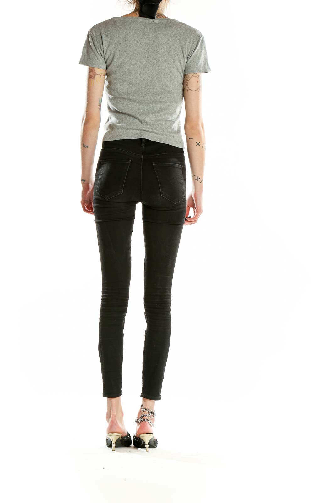 Back view of gray Frye cotton Henley crop top on model with black jeans