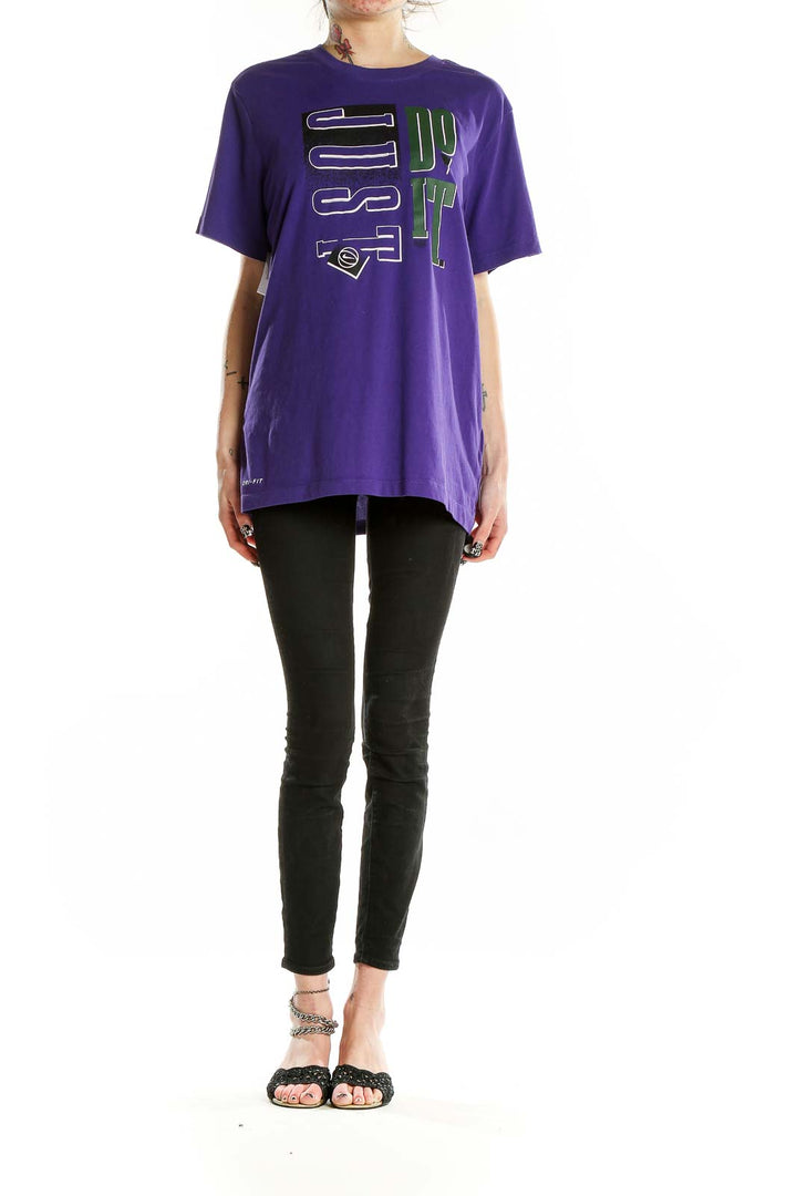 Front view of purple Nike activewear t-shirt with graphic print