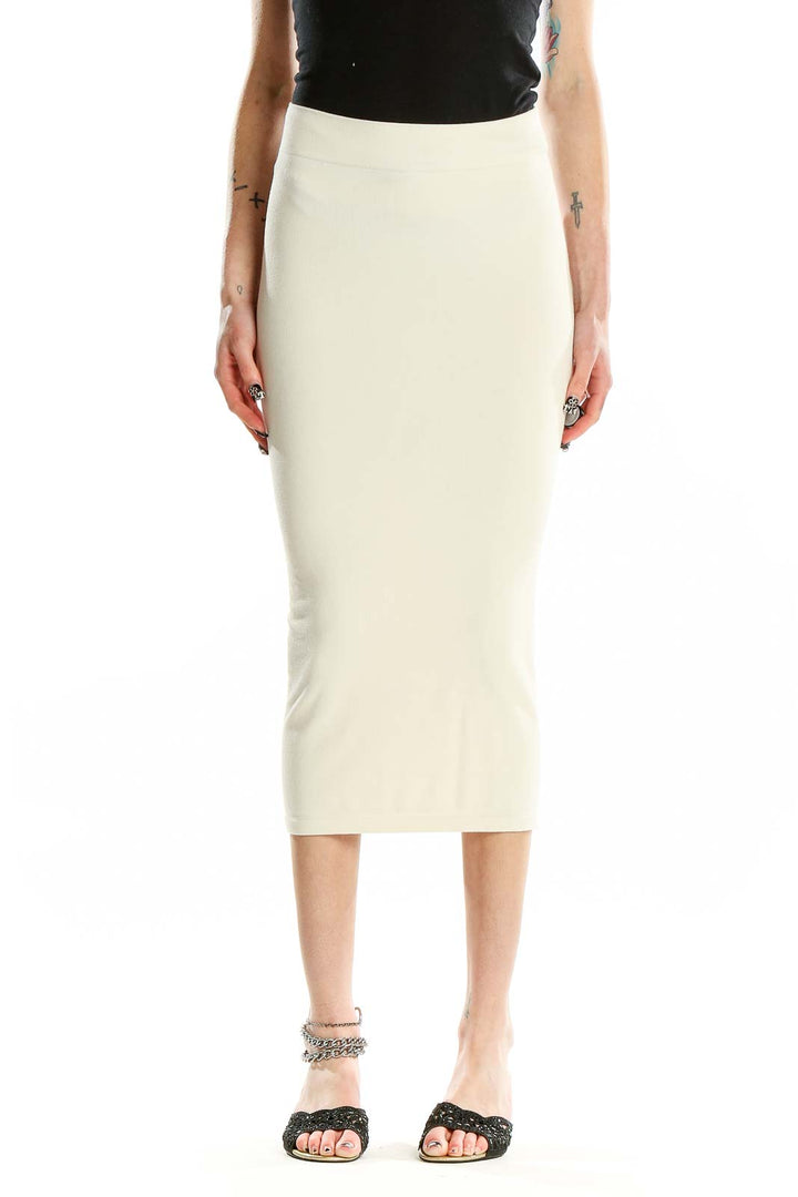 Front view of cream fitted midi skirt from Zara