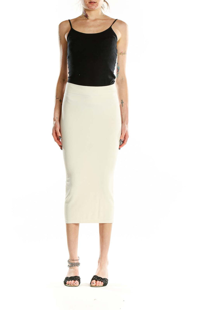 Front view of cream fitted midi skirt from Zara