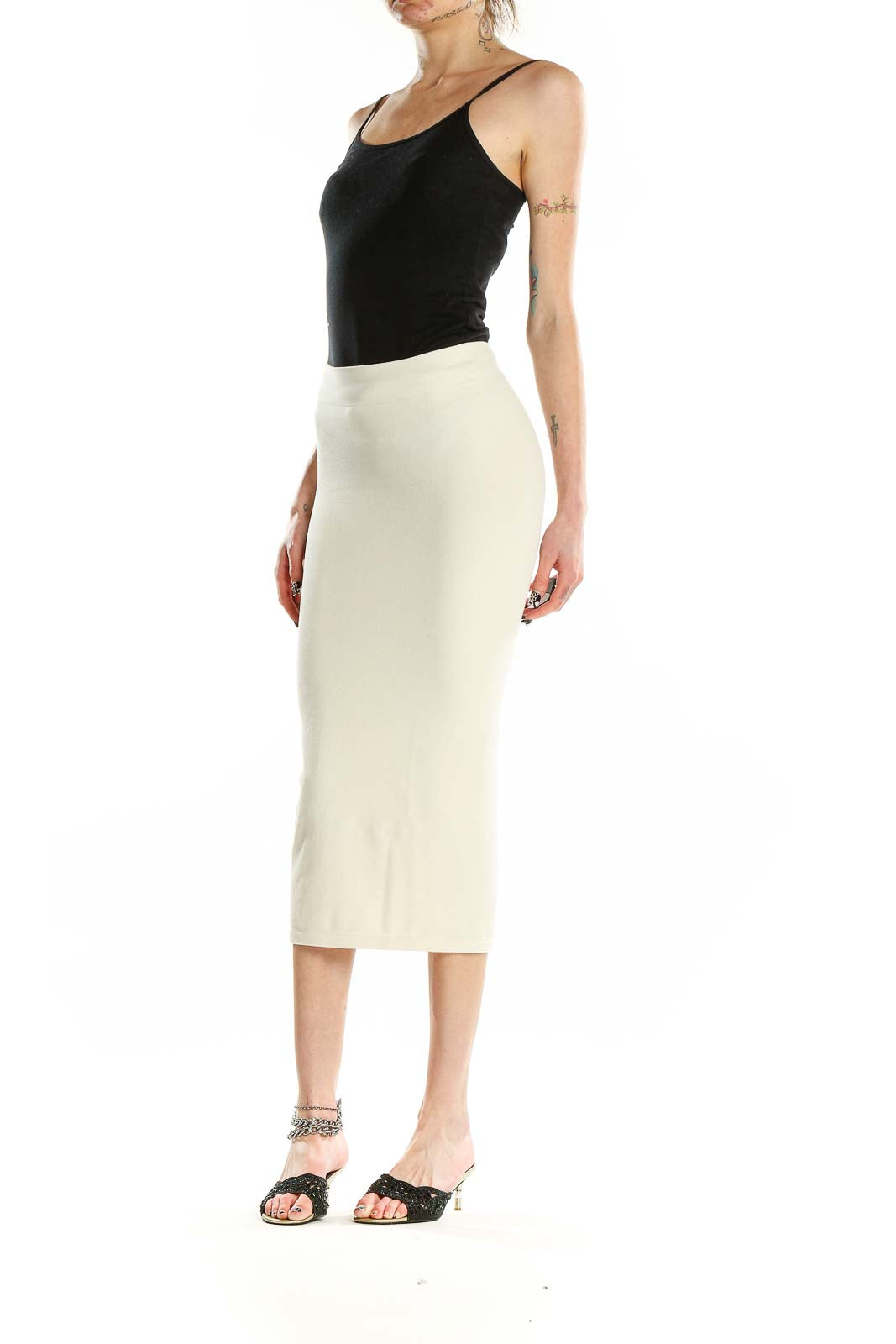 Front view of cream fitted midi skirt from Zara