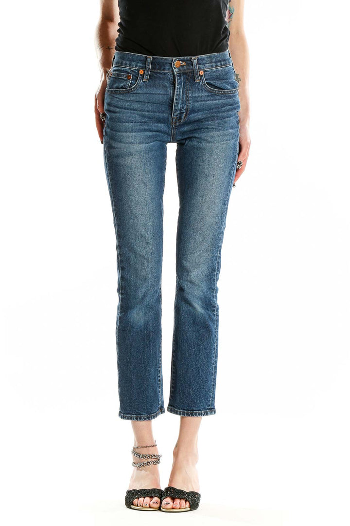 Front view of Madewell blue cropped straight-leg jeans on model