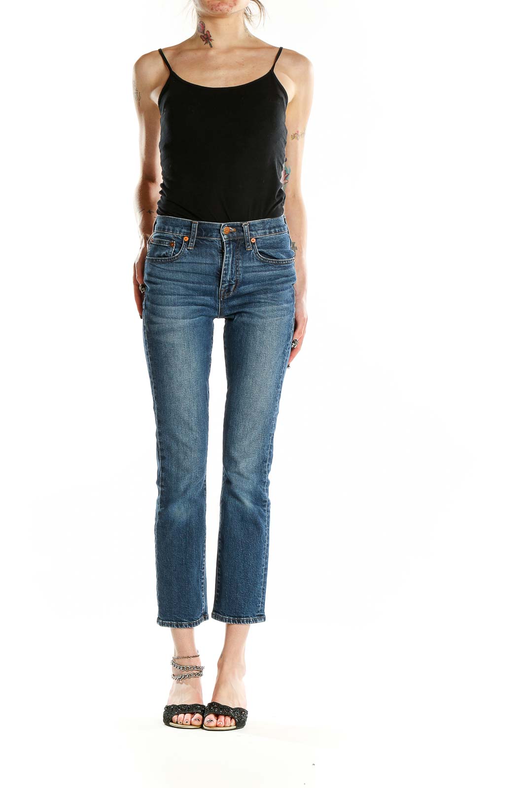 Front view of Madewell blue cropped straight-leg jeans on model