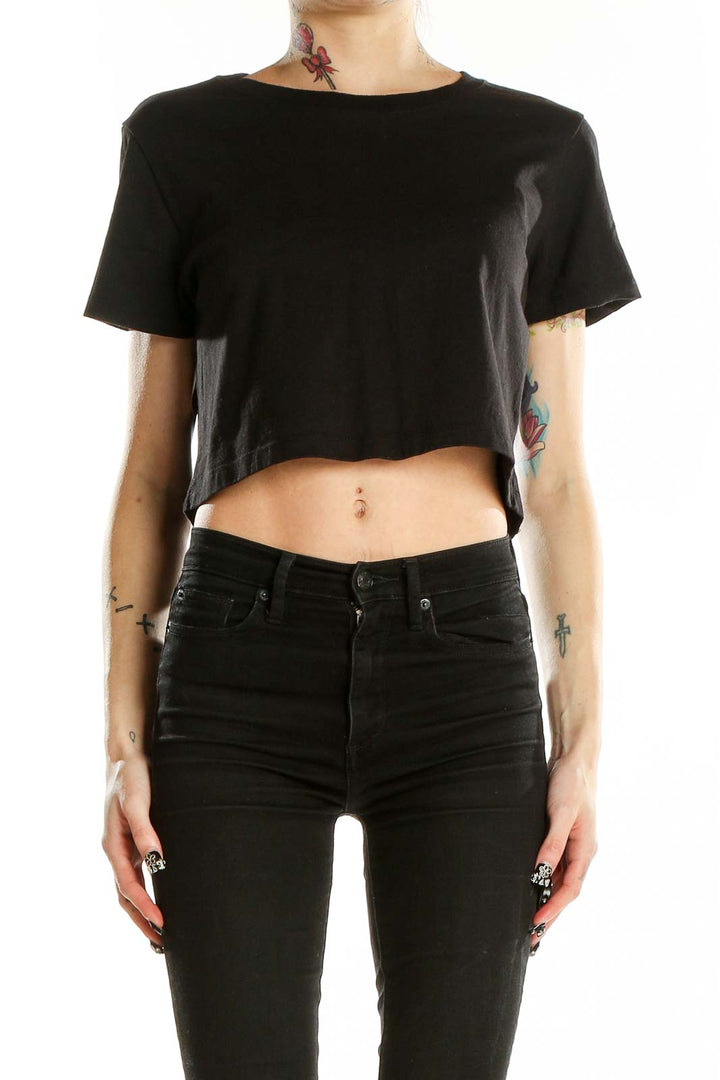 Front view of black cropped cotton t-shirt from Urban Outfitters