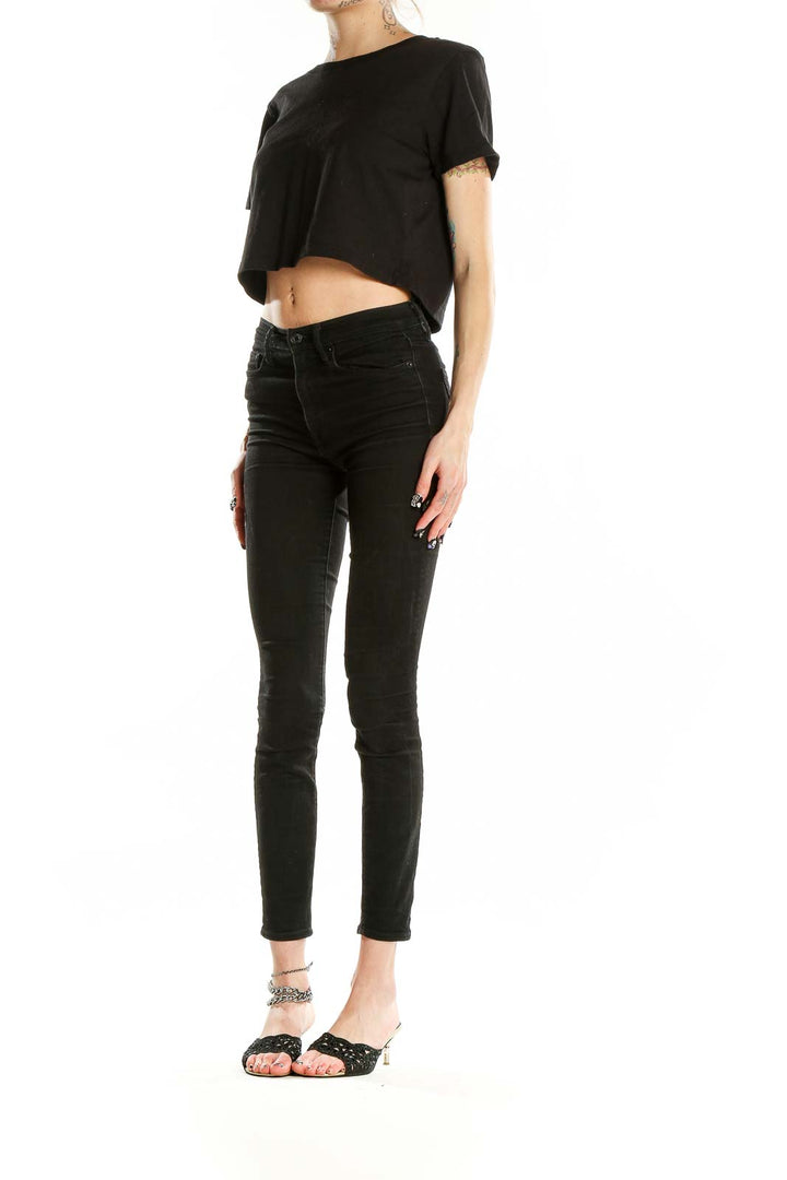 Front view of black cropped cotton t-shirt from Urban Outfitters