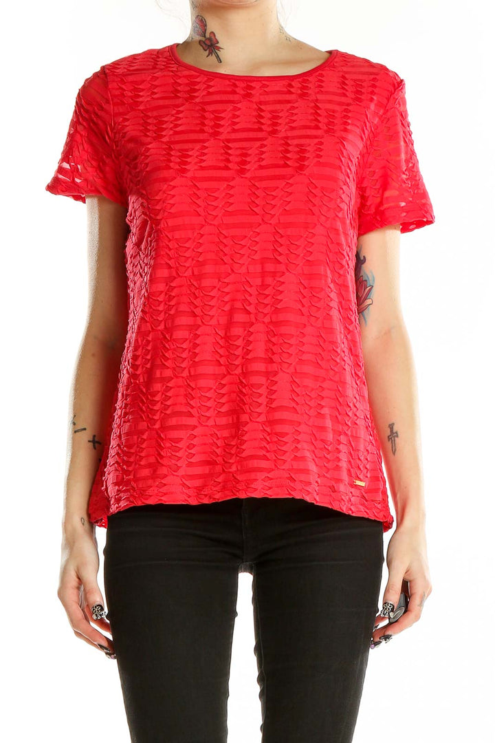 Front view of red textured short sleeve top by Calvin Klein