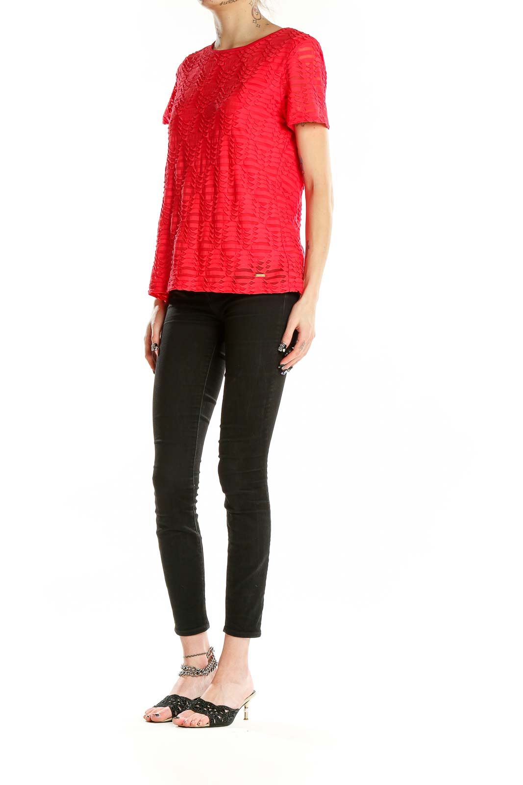 Front view of red textured short sleeve top by Calvin Klein